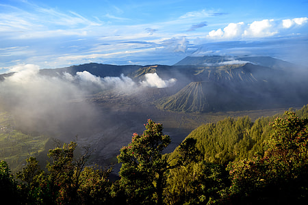 aerial view of mountain with clouds during daytime thumbnail