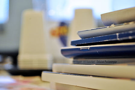 shallow focus photography of pile of books thumbnail