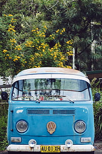 blue and white Volkswagen car at the road thumbnail