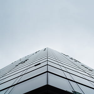 worm's eye view photography of building thumbnail