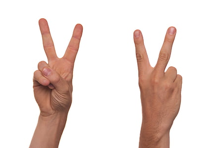 person's hand showing peace sign thumbnail