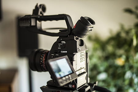 selective focus photography of black DSLR camera thumbnail