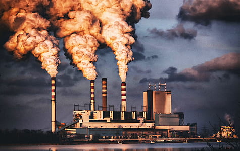 white and black nuclear plant emitting smoke thumbnail