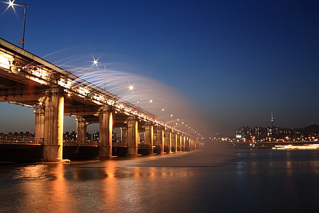 view of bridge during nighttime thumbnail