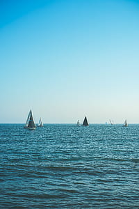white boats on sea thumbnail