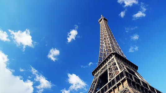 low-angle photography of Eiffel tower, Paris under cloudy sky at daytime thumbnail