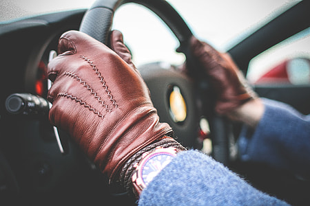 Driver with Brown Leather Driving Gloves thumbnail