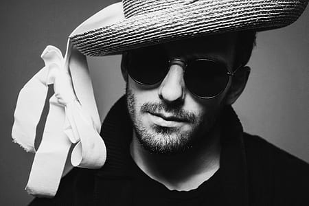 man wearing hat and sunglasses thumbnail