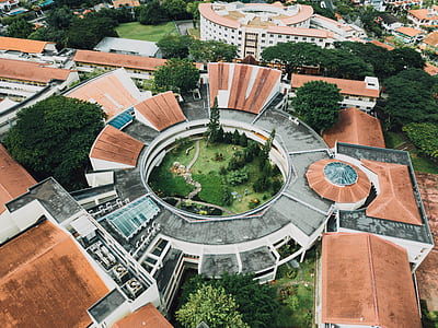 high-angle photography of round concrete building thumbnail