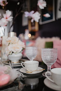 Porcelain and glass dishware on the glass table thumbnail