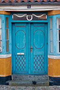 closed blue door building thumbnail