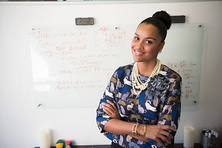 Woman Standing in Front of Whiteboard thumbnail