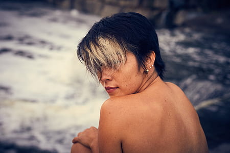 topless woman near water thumbnail