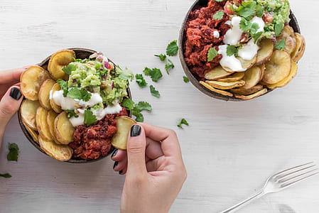 person holding potato chips salad thumbnail