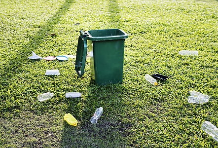Green Trash Bin on Green Grass Field thumbnail