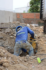 man using yellow power tool thumbnail