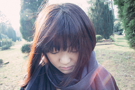 Sad girl in park thumbnail