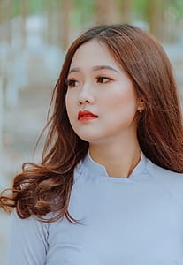 Woman Wearing Gray Crew-neck Top thumbnail