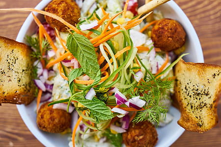 fried food and salad on bowl thumbnail