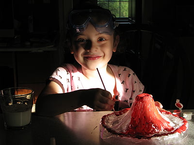girl doing art on table thumbnail