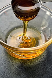 clear glass container with brown liquid thumbnail