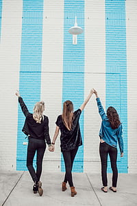 three woman holding there hands thumbnail