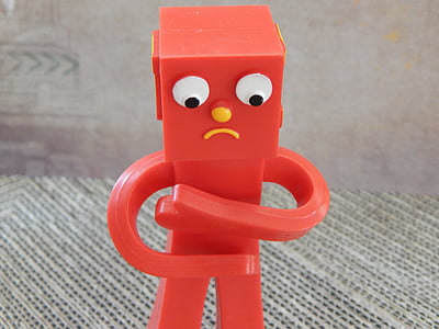close-up photography of red toy robot thumbnail