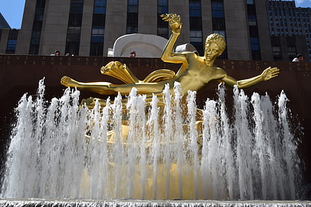gold statue in fountain thumbnail