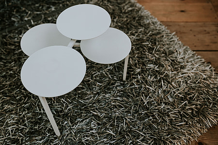 Various designer chairs and tables on an exhibition thumbnail