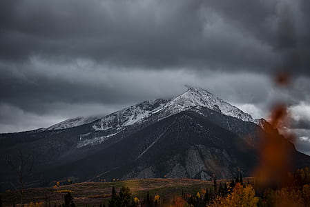 mountain under cloudy sky thumbnail