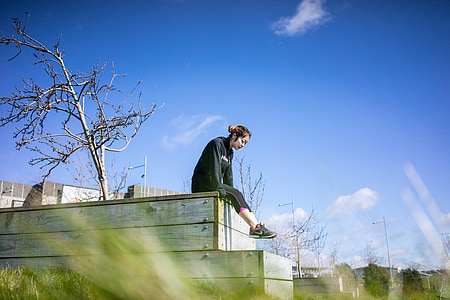 woman sitting on bench thumbnail