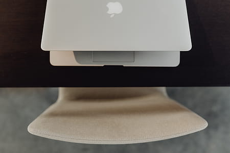 Stylish workspace with MacBook computer on home or studio thumbnail