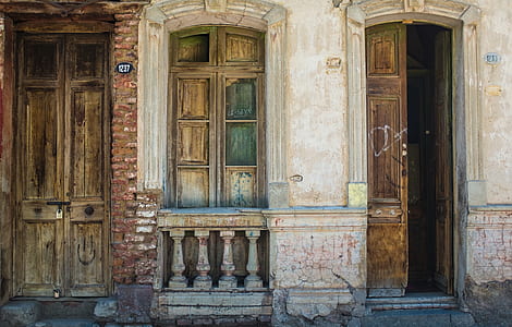 opened brown wooden door thumbnail