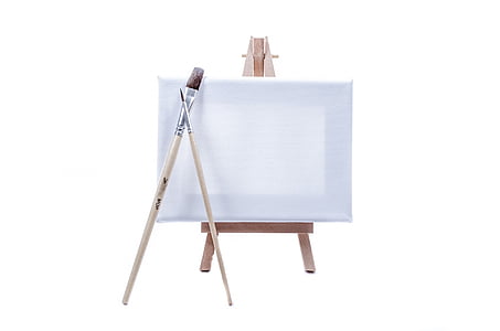 white paint canvass, easel, and two paintbrushes thumbnail
