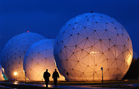 person's near three white globe design thumbnail