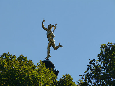 man holding staff statue thumbnail