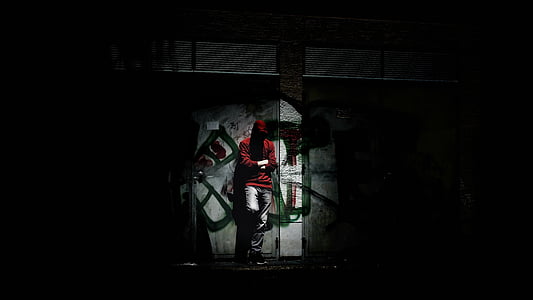 person wearing red jacket thumbnail
