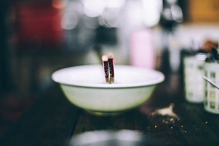 bokeh photography of white bowl thumbnail
