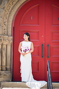 Woman Standing Beside Door thumbnail