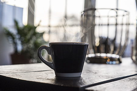 black and white teacup on table thumbnail