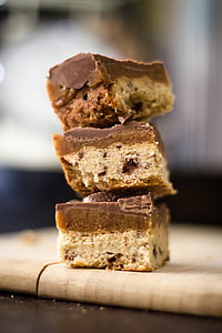 stack of chocolate bars on beige surface thumbnail