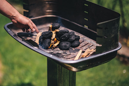 Pork and sausage on the grill thumbnail
