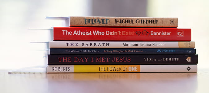 Six Assorted-title Books on White Desk thumbnail
