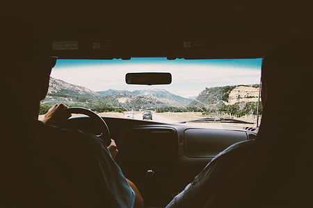 two person riding vehicle during daytime thumbnail