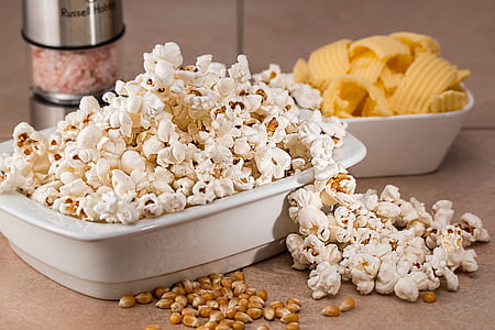 cooked popcorn on white ceramic bowl thumbnail