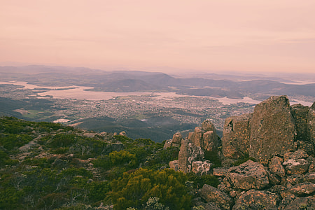 gray rock formation on mountain top during daytime thumbnail