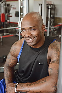 man wearing black Nike sleeveless top thumbnail