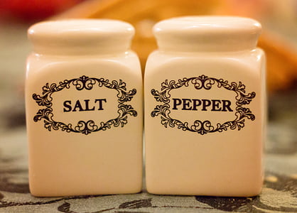 two white ceramic condiment canisters thumbnail