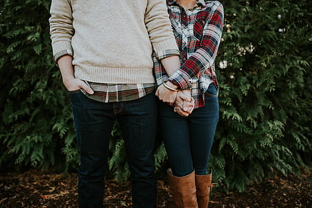 man holding the hands of the woman thumbnail