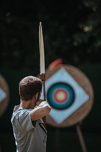 man using archer aiming target thumbnail